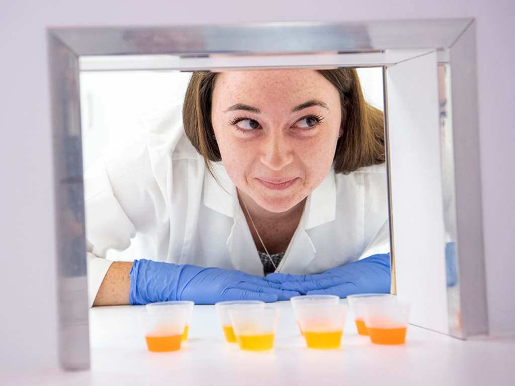 Student looking at samples in a lab