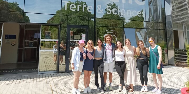 Group of students outside lab in Brazil.