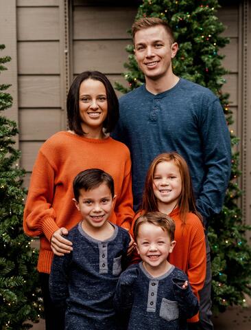 Captain Andrew Beghul, his wife, and three kids. 