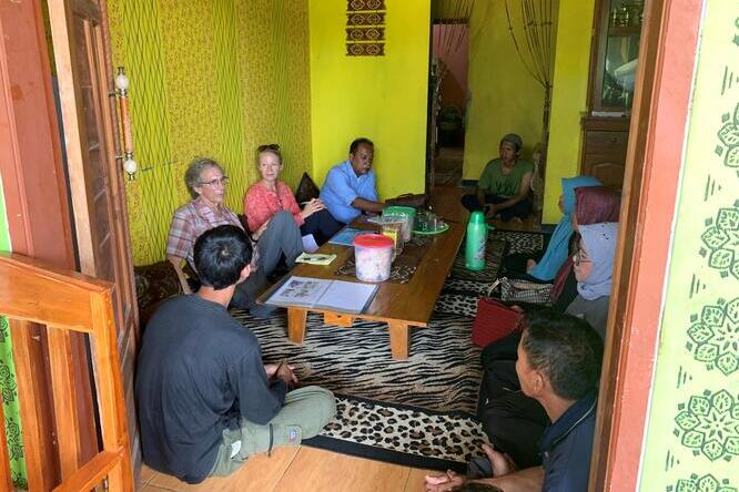 ADMI team at a farmers meeting in Indoneisa