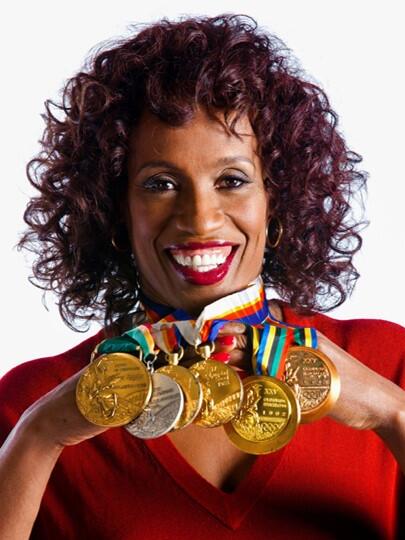 Jackie Joyner-Kersee with Olympic medals