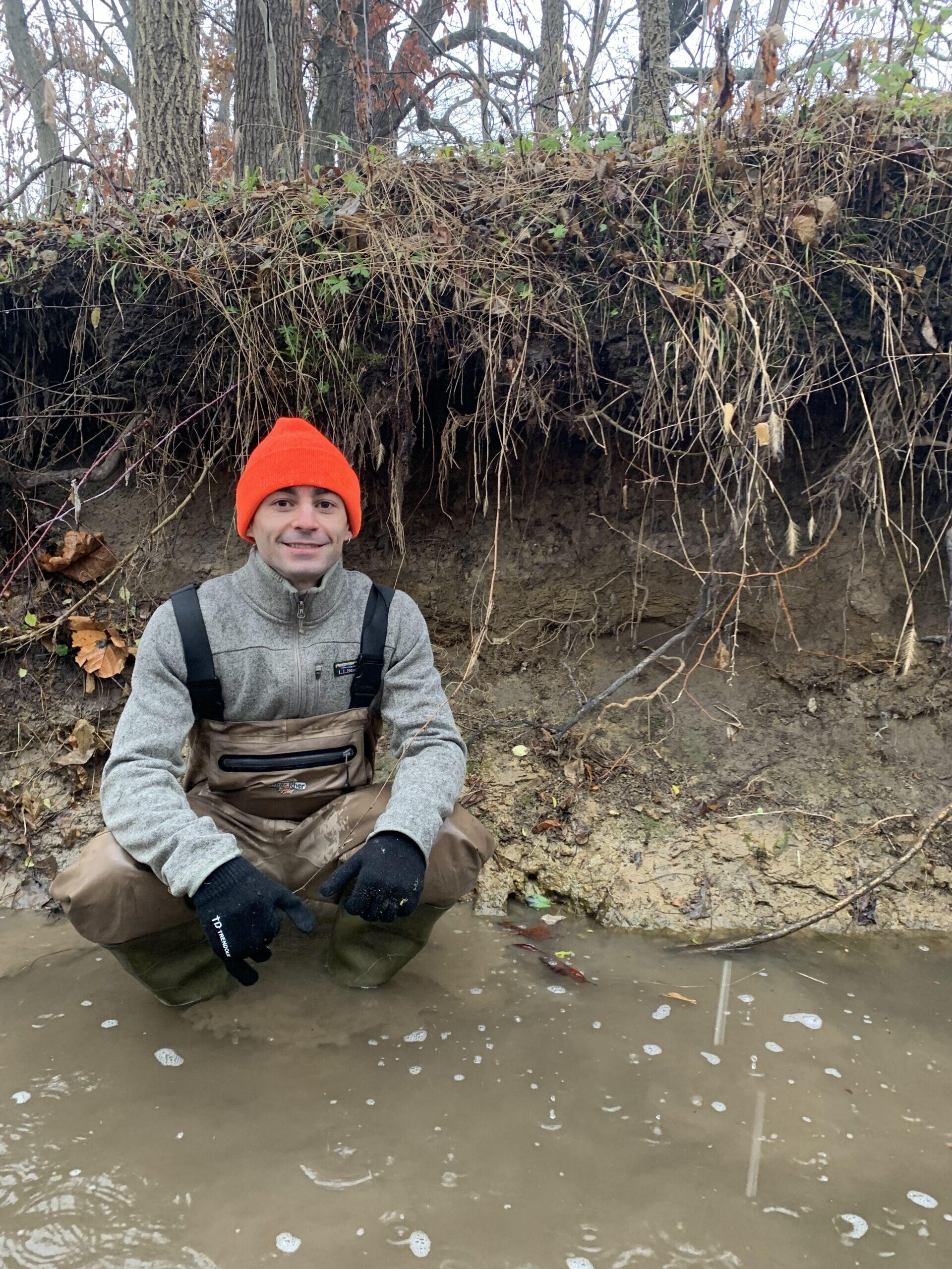 Andrew Margenot next to undercut streambank in Coles County, Ill.