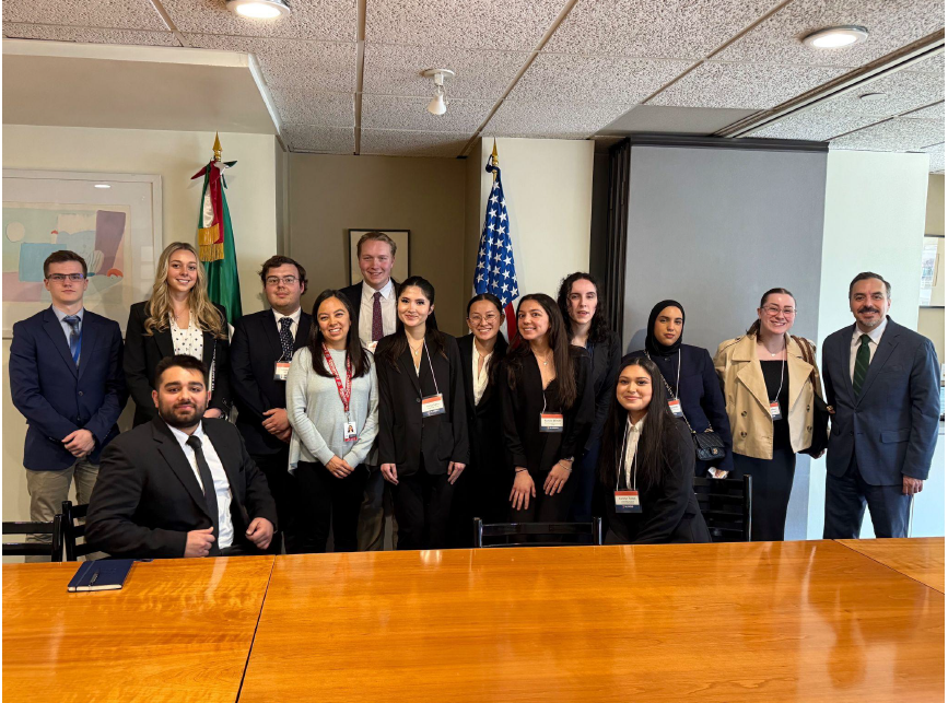 A picture the class visiting the Mexican Embassy with our guest speakers.