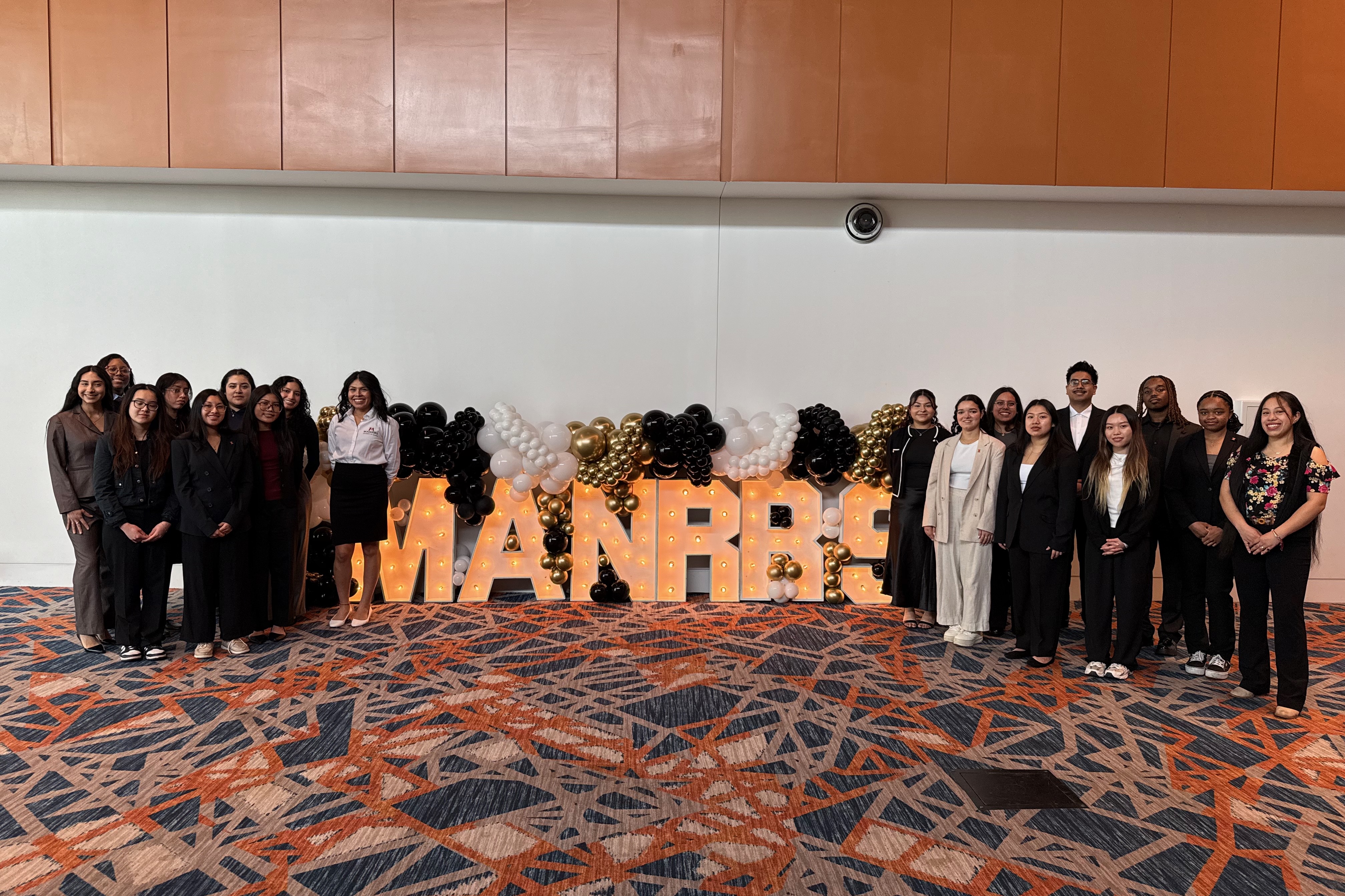 MANRRS group photo with the MANRRS lighted letters