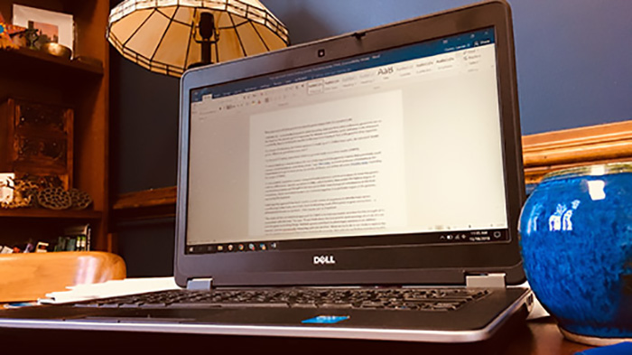 A laptop sitting on a desk