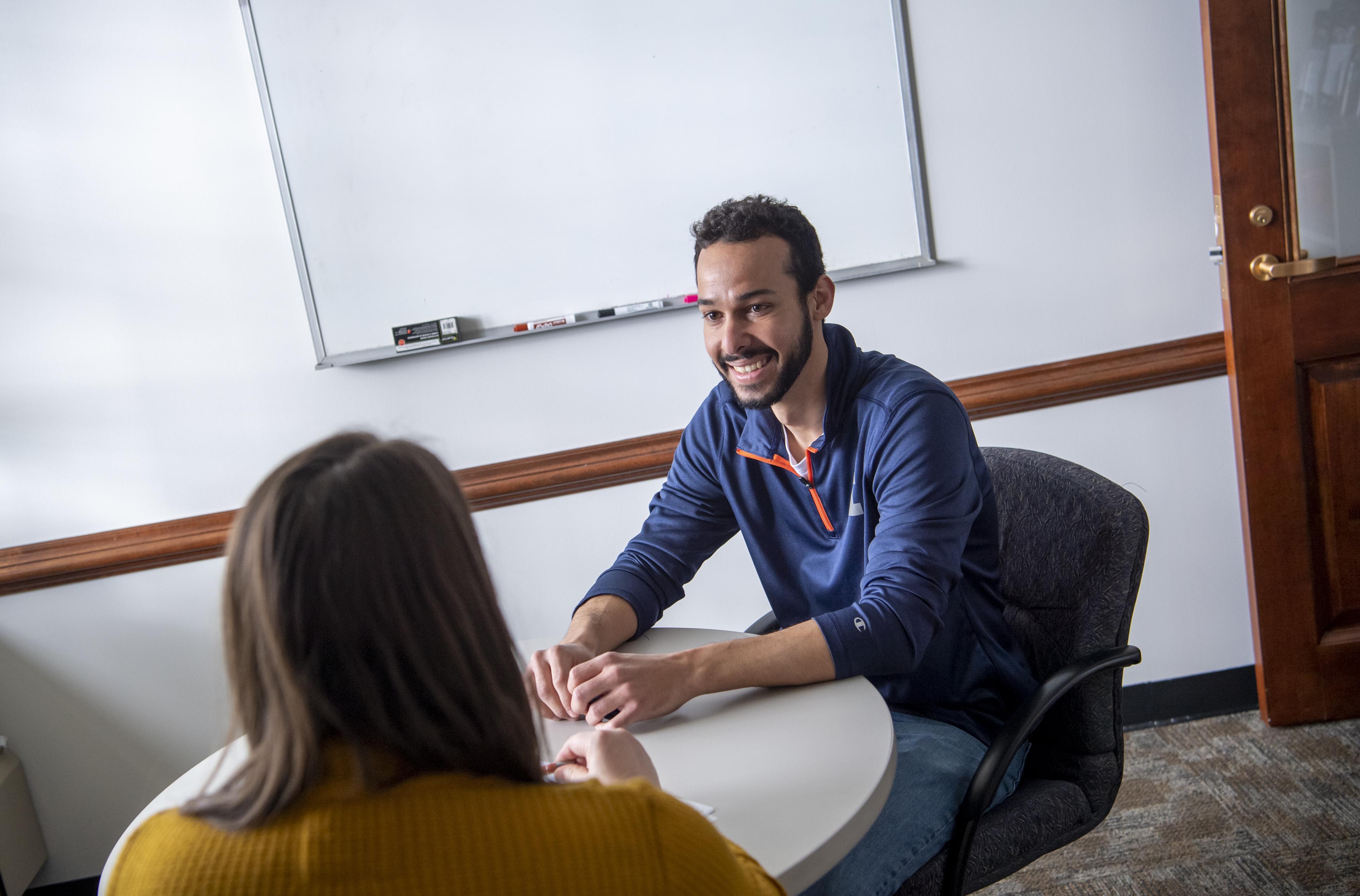 Students speaking with each other