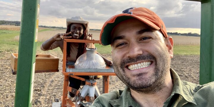 Student working in rice fields in Colombia.
