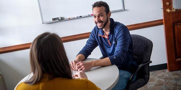 Students talking and smiling