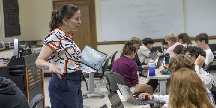 A classroom full of ACE students being taught by an instructor.