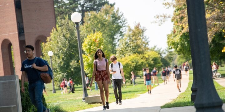 Students walking on ACES campus.