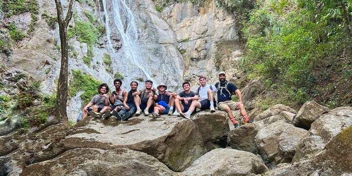 Group of students in front of a waterfall in Costa Rica
