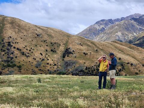 Bob Hauser and Jack Cocks stand together on 100,000- acre sheep and cattle ranch