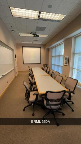 A small conference room, labeled "ERML 350A," features a long table surrounded by chairs, with a projector screen and whiteboard at the front.