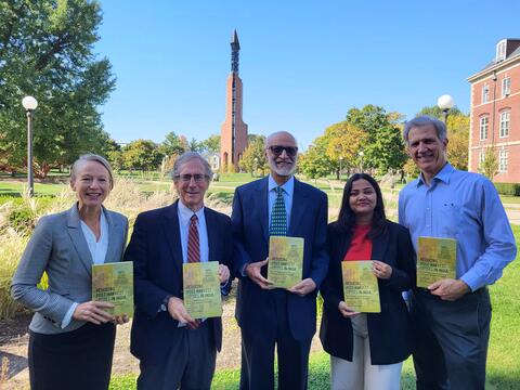 authors showing off the new book