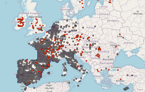 Map of Europe covered with small black and red circles denoting the locations of invasive crayfish and crayfish pathogens.