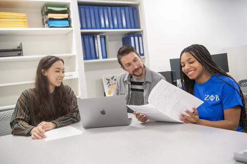A student reviewing feedback on a written assignment.