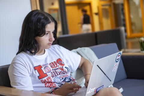 ACES Student on laptop