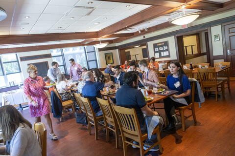 ACES students and staff eating at a diner.