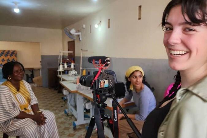 Elena Cleary working on a documentary in Sierra Leone.