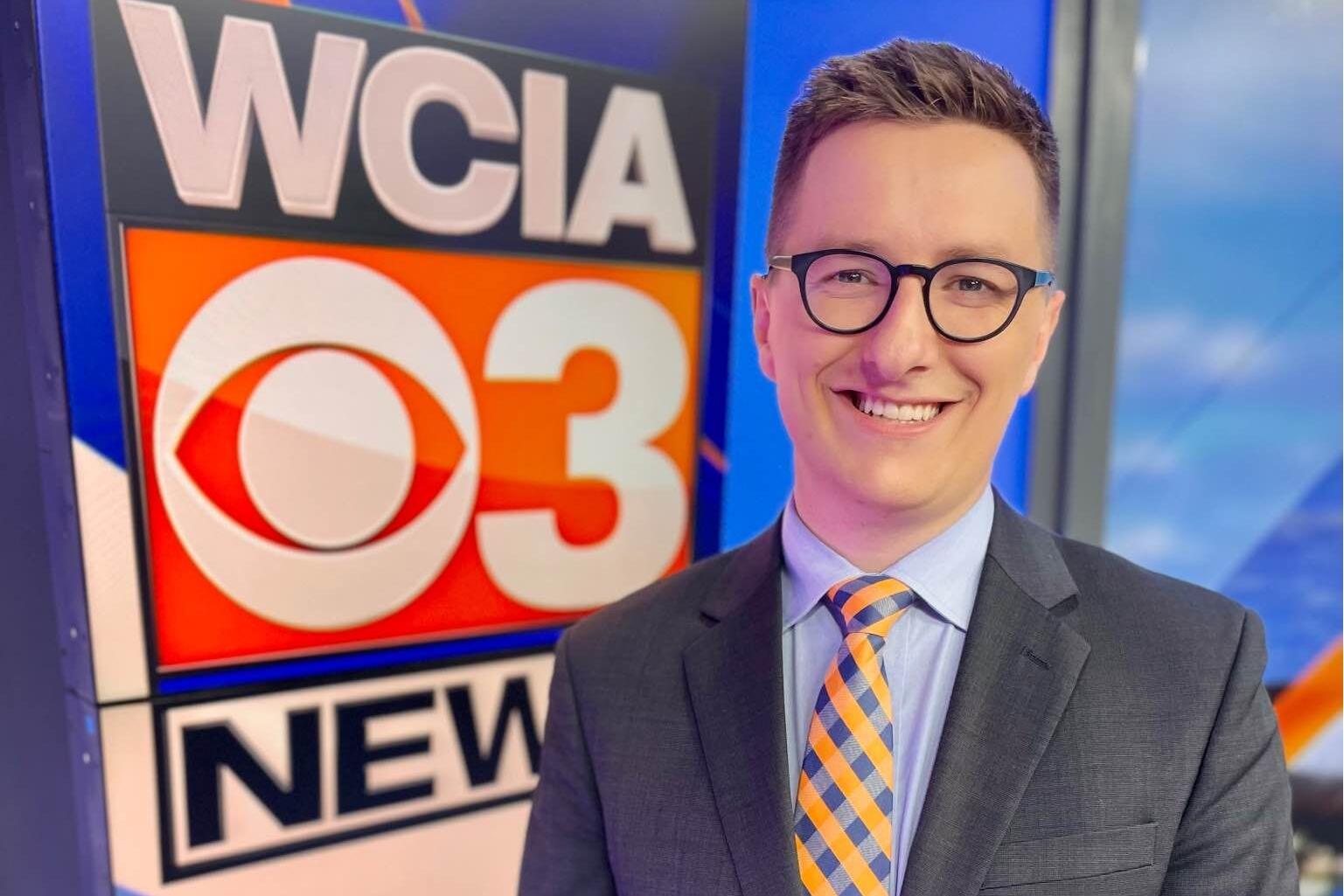 Jacob Dickey smiles in the WCIA 3 News studio. 