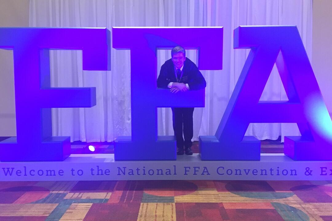 Student with large FFA letters 