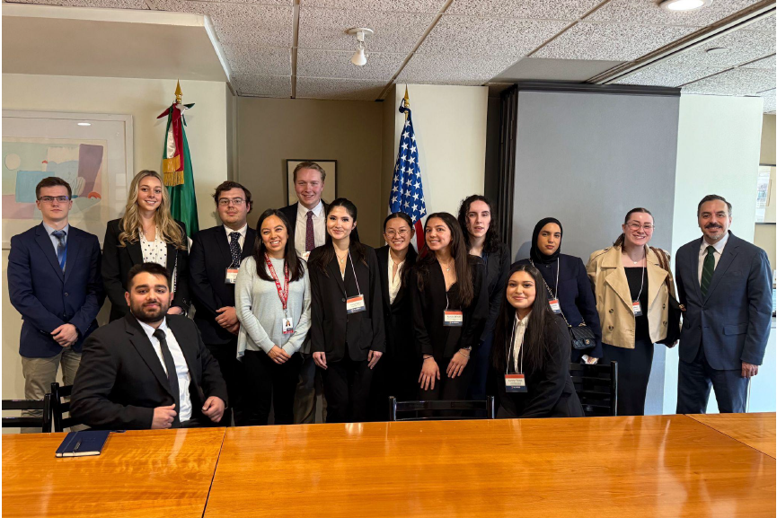 A picture the class visiting the Mexican Embassy with our guest speakers.
