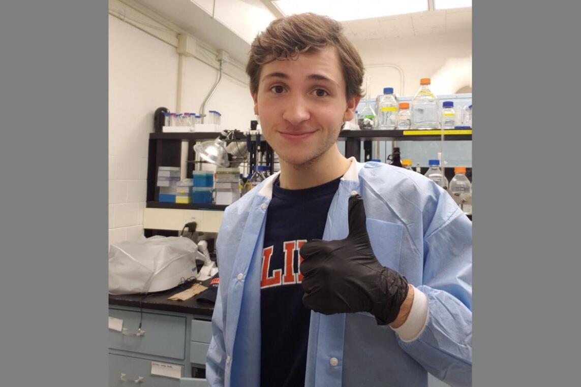 Patrick giving a thumbs up in a clinical setting