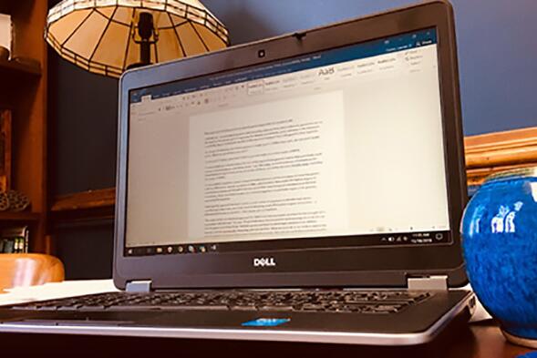 A laptop sitting on a desk