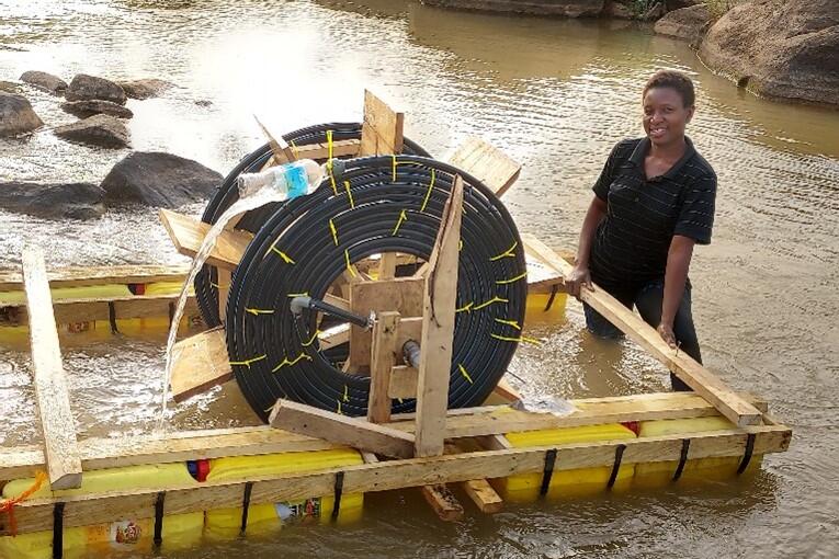 During the survey at Gbonkolenken chiefdom, Yele, pump construction and installation.