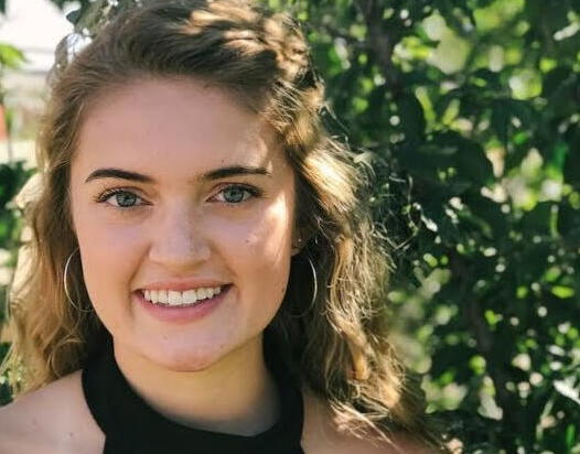 close up of Hanna Hawkinson standing outside