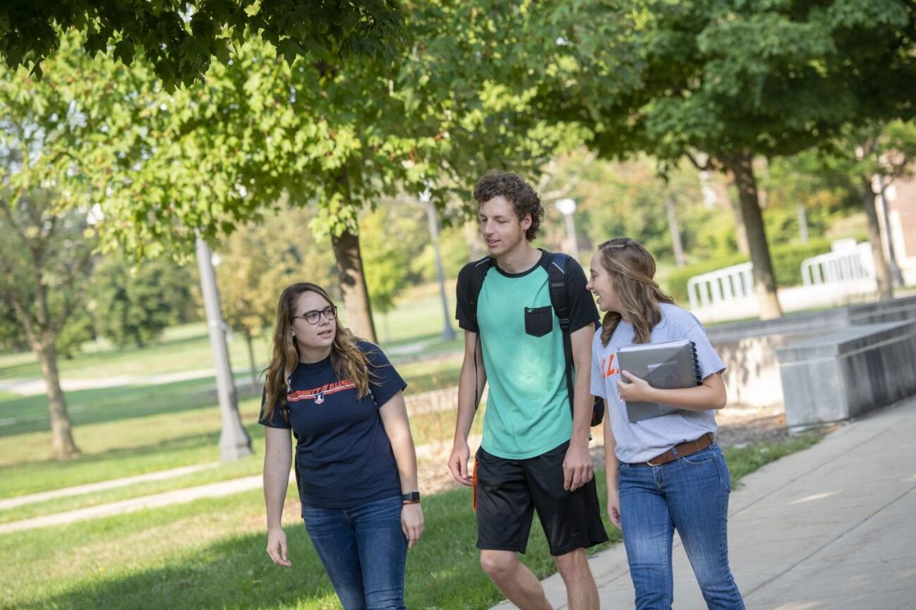 students walking on campus 