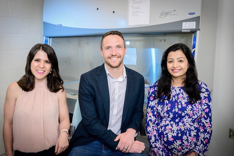 From left, postdoctoral researcher Elisa Caetano-Silva, kinesiology and community health professor Jacob Allen, Ph.D. student Akriti Shrestha