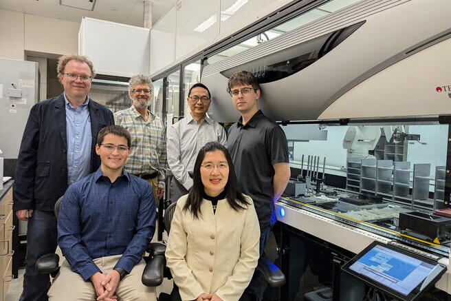 Graduate Student Seth Croslow, Research Scientist Jia Dong, Co-PIs Mathew Hudson, Jonathan Sweedler, Huimin Zhao and Biofoundry Manager Stephan Lane pose together for a group photo at the Carl R. Woese Institute for Genomic Biology