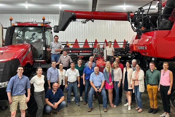 farmers from Germany and U.S. by tractors
