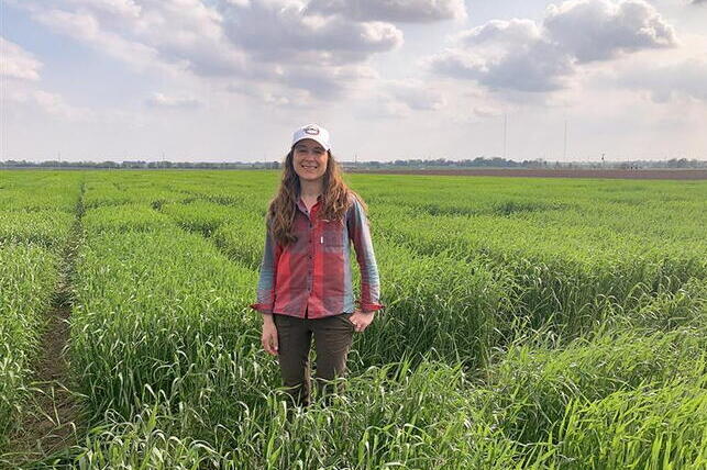 Jessica Rutkoski will co-lead the first events of the 2025 Agronomy Days series Assistant Professor Jessica Rutkoski stands amongst a green field