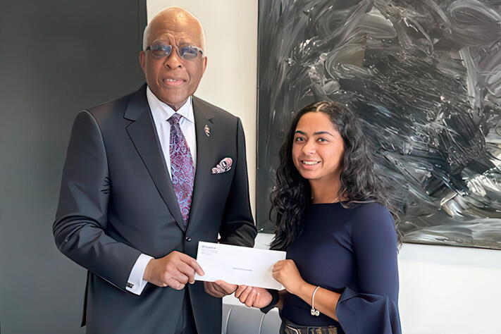 Chancellor Robert Jones with award winner Hannah Sundararajan