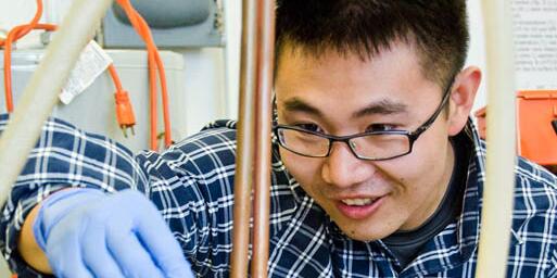 Student working on an object