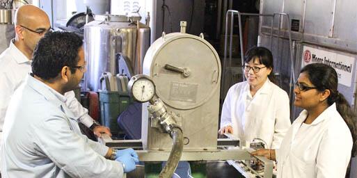 Students working with machinery