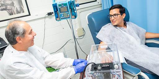 Student getting examined in a lab