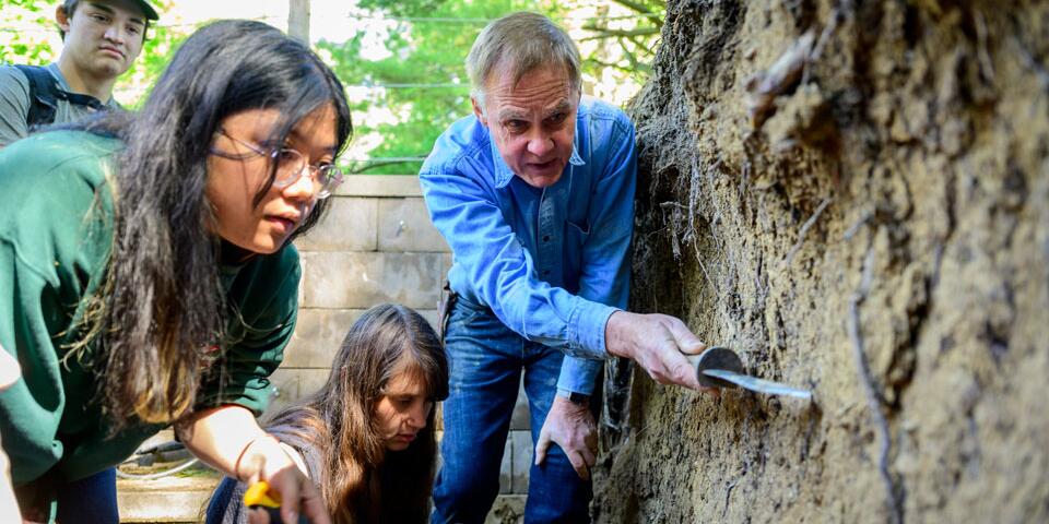 Students studying soil.