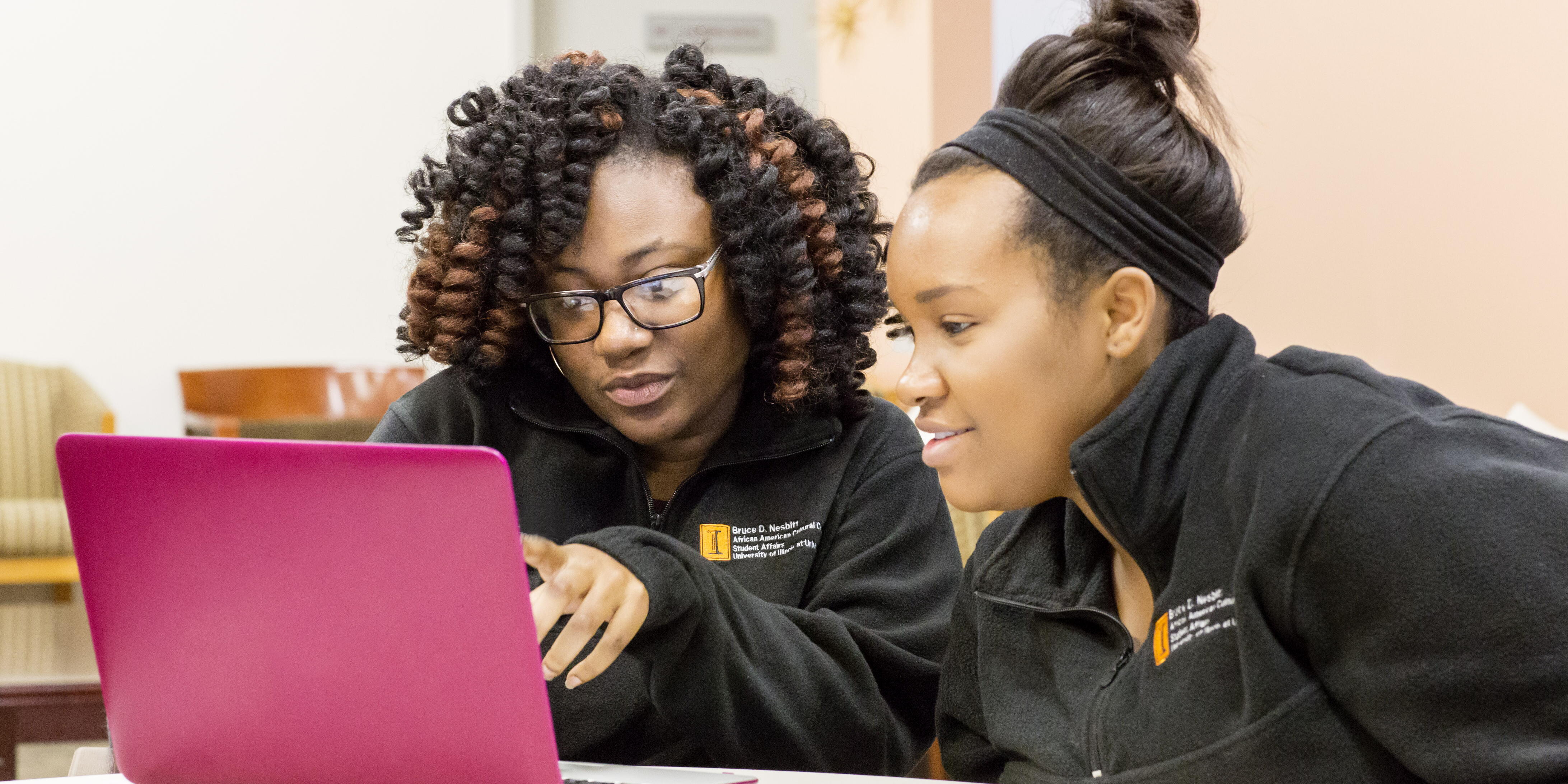 Students working on laptop computer